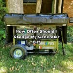 how often should I change my generator oil white text on picture of dual fuel generator