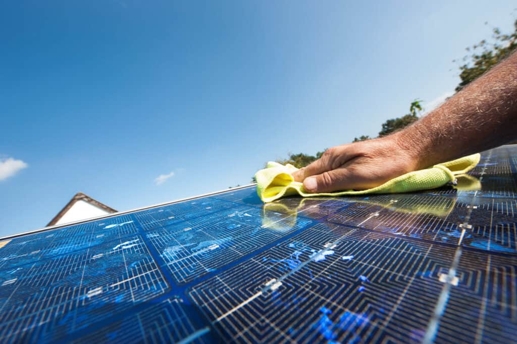 maximizing effeciency how to optimize solar generator maintenance cleaning panel 1200x798 1